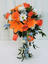 Orange and blue cascade bouquet from local Myrtle Beach florist, Bright & Beautiful Flowers
