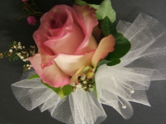 Rose Corsage backed with white netting and gold splash from local Myrtle Beach florist, Bright & Beautiful Flowers